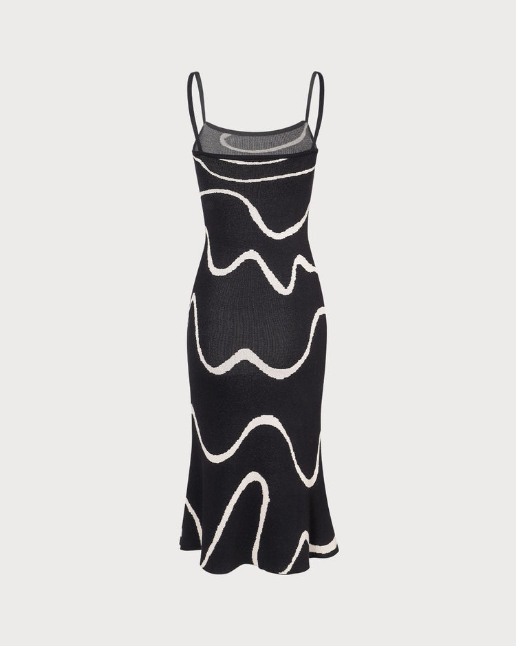 Vestido midi negro de punto con dobladillo en onda y silueta de sirena ajustado